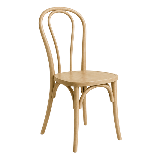 A bentwood chair in a light natural wood finish.
