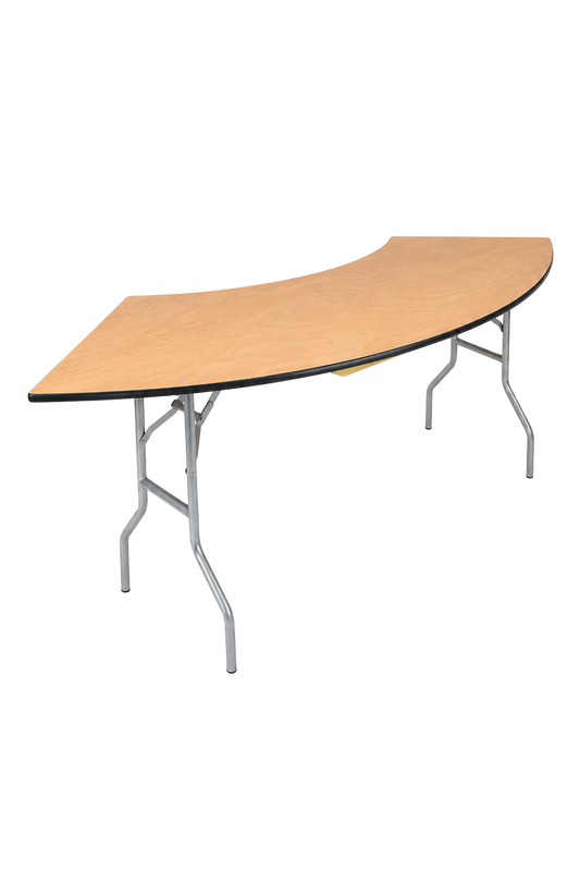 A curved table with a light wood grain top and silver metal folding legs.